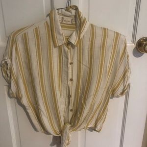 Collared yellow striped shirt with a tie bottom